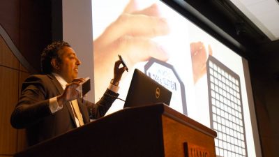 Atul Butte, M.D., Ph.D., shows the gene chips that he carries around with him. Once incredibly expensive, they are now affordable enough to carry in his pocket and briefcase.