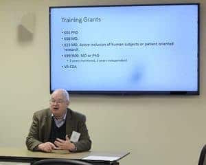 John Arthur, M.D., Ph.D., explains different federal research grant programs. Arthur also is director of the Division of Nephrology in the College of Medicine's Department of Internal Medicine.