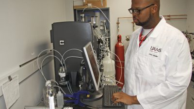 Bolden working in lab