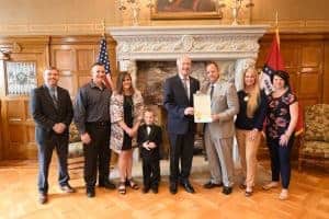 Mohorn was invited to the state Capitol to see Gov. Asa Hutchinson sign a proclamation declaring May to be Better Hearing and Speech Month.
