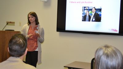 Marie Burdine, Ph.D., left, makes her presentation to the judges, foreground, during the final class session of the fastPace course.