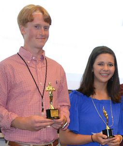 Daniel Wheeler of Maumelle, left, and Hannah Pettit of Fordyce respectively received the Male Camper of the Week and Female Camper of the Week awards at Pharmacy Camp.