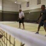 David Flory (r) and Rick Gautier (l) play a game of pickle ball.