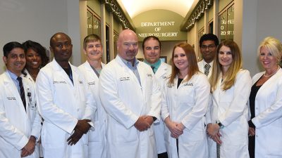 Seen here outside the UAMS Department of Neurosurgery, the UAMS Medical Center stroke team along with other UAMS physicians and staff recently achieved Comprehensive Stroke Center desgination for the medical center.