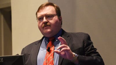 Dr. McKinnon at podium