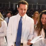 After receiving their white coats, members of the College of Pharmacy's Class of 2022 recite the Student Pledge of Professionalism.