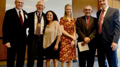 William "Bill" Ventres, M.D. (second from left) with his wife, Estella, and daughter Cory, as well as (from left) College of Medicine Dean Christopher Westfall, M.D., Erick Messias, M.D. and Daniel Knight, M.D.
