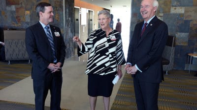 Winthrop P. Rockefeller Cancer Institute Interim Director Laura Hutchins, M.D., (center) leads Arkansas Gov. Asa Hutchinson (right) and UAMS Chancellor Cam Patterson, M.D., MBA, on a tour of the Cancer Institute.