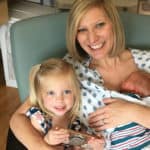 Carley Neill shares a joyful moment with her daughter, Emory, and newborn son Eli.