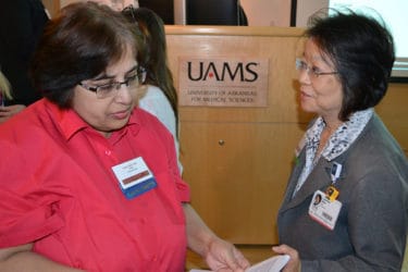 Gohar Azhar, M.D., left, confers with Jeanne Wei, M.D., Ph.D.,, between speakers at the Geriatric Update.