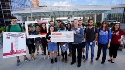 Group photo with check