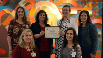 UAMS faculty who worked on the award application include (from left): Kathryn Neill, Pharm.D.; Susan Long, Ed.D.; Wendy Ward, Ph.D.; Amber Teigen, M.M.Sc.; and Lisa Rhoden, M.Ed.