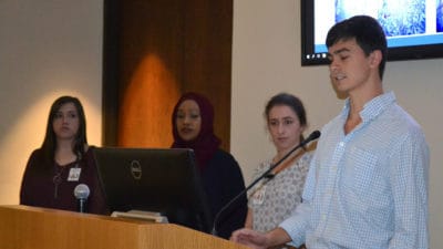 Students at podium