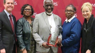 UAMS Chancellor Cam Patterson, M.D., MBA (left), and TRI Director Laura James, M.D. (far right), presented the award to the Rev. William H. Robinson, Deborah Bell and Arlene Williams.