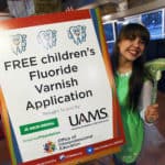 The Delta Dental Tooth Fairy encourages Boo at the Zoo participants to get their free fluoride varnish application.