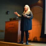 Lisa Miller, a lawyer and nurse midwife, speaks to her audience at the POWER workshop about legal issues in perinatal care.