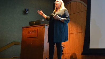 Lisa Miller, a lawyer and nurse midwife, speaks to her audience at the POWER workshop about legal issues in perinatal care.