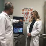 Mohamed Kamel, M.D. and Megan Thomas, A.P.R.N discuss imaging results.