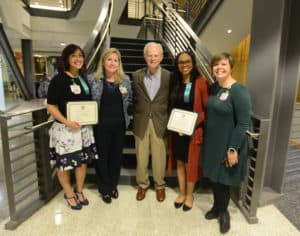 Ophthalmic Medical Technology (OMT) students Alicia Bratten (left) and Cornesha Day (second from right) said receiving a scholarship that bears the name of John Shock, M.D., (center) was an incredible honor. Also pictured are CHP Dean Susan Long and Alicia Baird, chair of the OMT program.