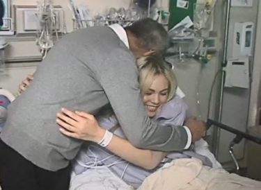Doctor and patient hugging