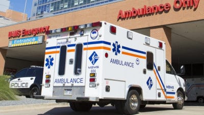 Ambulance at an ER entrance.