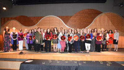 The 2019 UAMS Phenomenal Women on stage with their awards following the event.