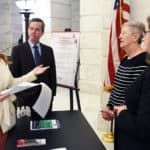 Arkansas Sen. Missy Irvin of Mountain View (left) visits with UAMS Chancellor Cam Patterson, M.D., MBA; Cancer Institute Interim Director Laura Hutchins, M.D.; and Dorothy Graves, Ph.D., Cancer Institute associate director of administration, during UAMS Day at the Capitol.