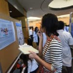 Attendees browse posters at the 2019 Annual Arkansas Nursing Research Conference.