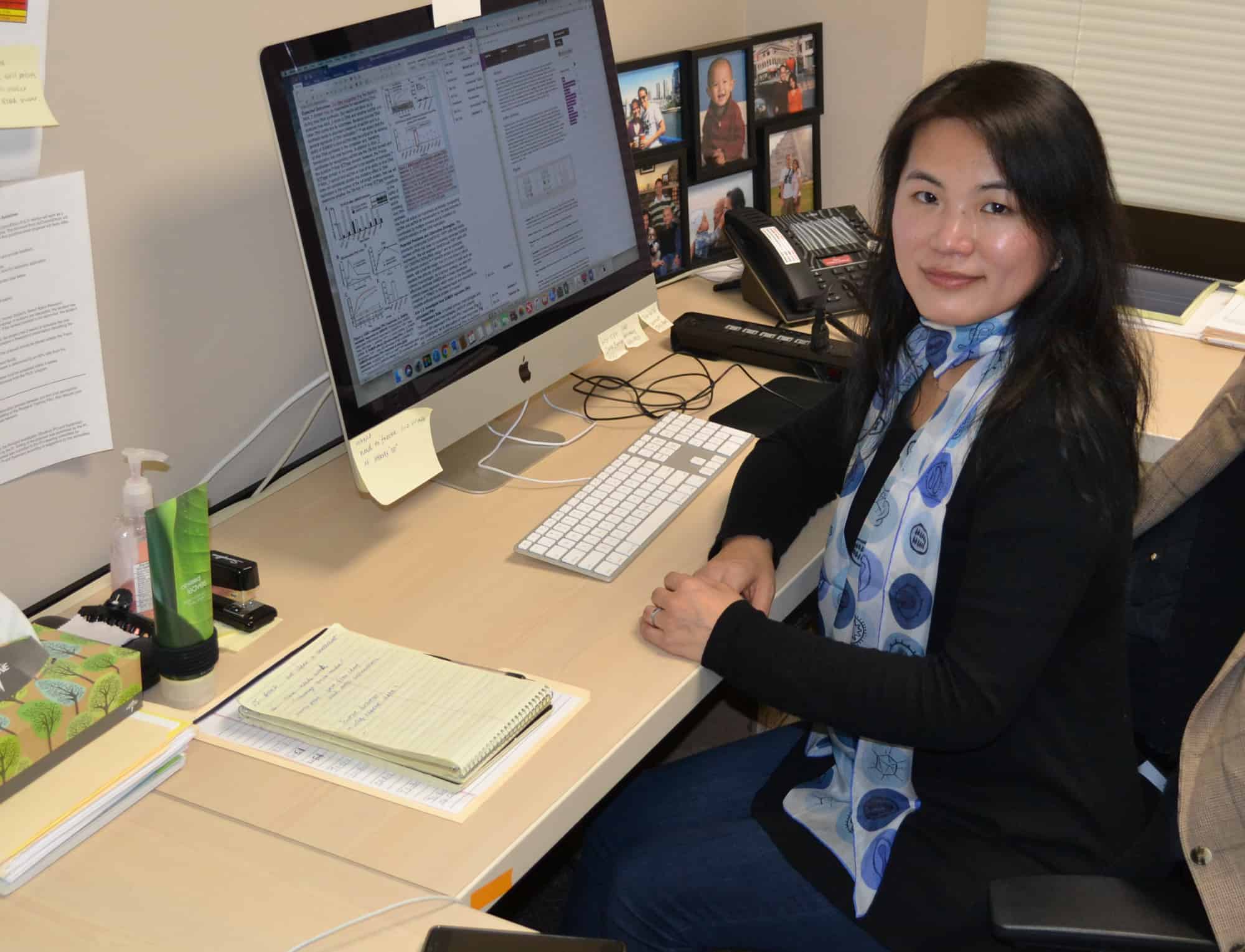 Dr. Liu at desk