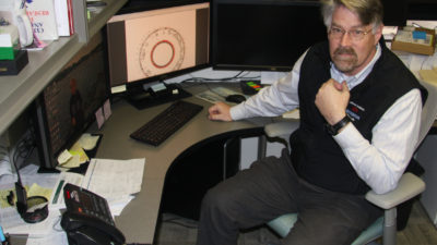 Dr. Johann at desk