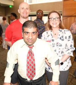 Nauman Pathan (center) interned in the Fitness Center with Adam Carter and Natalie Cannady.