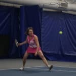 Michele Perry plays tennis at the Little Rock Athletic Club.