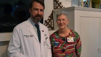 Matthew Steliga, M.D., (left) is joined by UAMS Cancer Institute Interim Director Laura Hutchins, M.D., following his introduction as the UAMS Cancer Institute Auxiliary Distinguished Honoree.