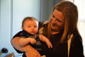 Laci Bratton holds her infant son, Cole.