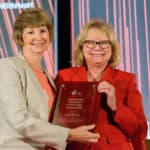 Jean McSweeney, Ph.D., RN, (left) receives the Volunteer of the Year Award at the American Heart Association ceremony in Dallas June 19, 2019.