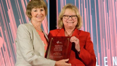 Jean McSweeney, Ph.D., RN, (left) receives the Volunteer of the Year Award at the American Heart Association ceremony in Dallas June 19, 2019.