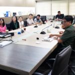 Schwanda Flowers, Pharm.D., far left, visits with faculty at Silpakorn University in Thailand.