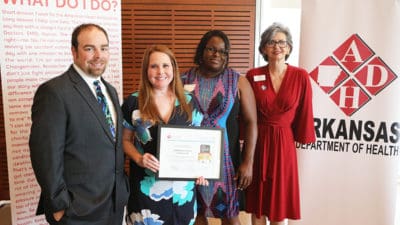 Matt Mitchell, left, Deonna Wissler and Patrice Moody accept the Get With The Guidelines Award from Joyce Taylor, far right.