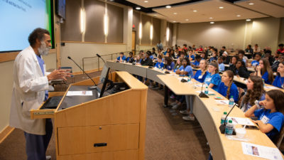 Billy Thomas, M.D., M.P.H., inaugural vice chancellor for diversity and inclusion, welcomes eighth grade students to the Roadmap to Success conference.