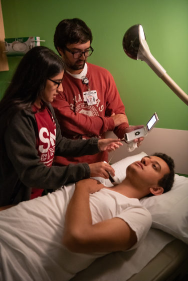 Students using ultrasound