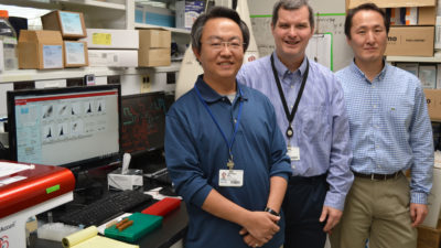 Researchers together in lab