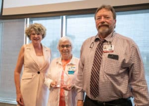 Darla and Robert Lavender, M.D., pose with Edwina Mann, (center) the Inaugural recipient of the Patricia Lavender Distinguished Service Award. The award was named in honor of Dr. Lavender’s mother, a long-time volunteer at UAMS and with the Arkansas Hospital Association.