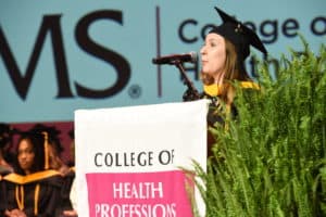 Brittney Mary Meays urges her fellow graduates to be society's helpers. Meays graduated from the Genetic Counseling program.