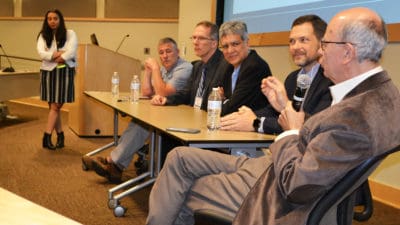 Shradda Thakkar, far left, moderates a panel discussion between Darin Jones, second from left, Robert Doerksen, Pravin Chaturverdi, James Sumpter and Cesar Compadre. The panel was part of the Drug Discovery & Development Colloquium at UAMS.