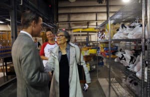Chancellor Cam Patterson, M.D., MBA, and Little Rock City Director Kathy Webb (right) tour Stocked & Reddie on July 15. <i>Photo credit, Katrina Dupins</i>