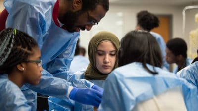 Students learn about cardiovascular disease during the health professions portion of the Academy of Pre Health Scholars program.