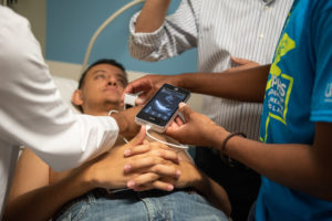 Instructors demonstrate ultrasound techniques and application in emergency response.