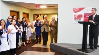 UAMS Chancellor Cam Patterson speaks to an audience gathered at the UAMS Northeast Regional Campus to celebrate campus' 40th anniversary.