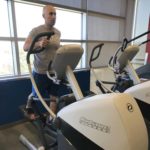 Adam Carter, manager of the UAMS Fitness Center, works out on an XT-One machine, one of six new pieces of equipment in the Fitness Center.