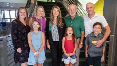 Scholarship recipient Erin McKinney (center) with Pat Hurst (second from right) and other members of the Ann Bowers Hurst family.
